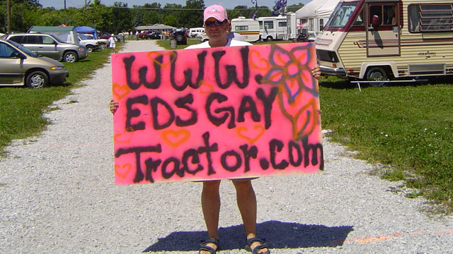 Ed holding the EdsGayTractor.com sign