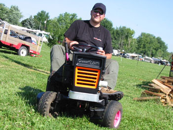 Ed riding the tractor